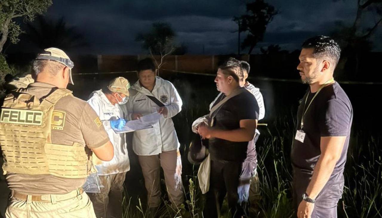 Hallan a un extranjero enterrado, maniatado y con impactos de bala en un lote baldío en Porongo