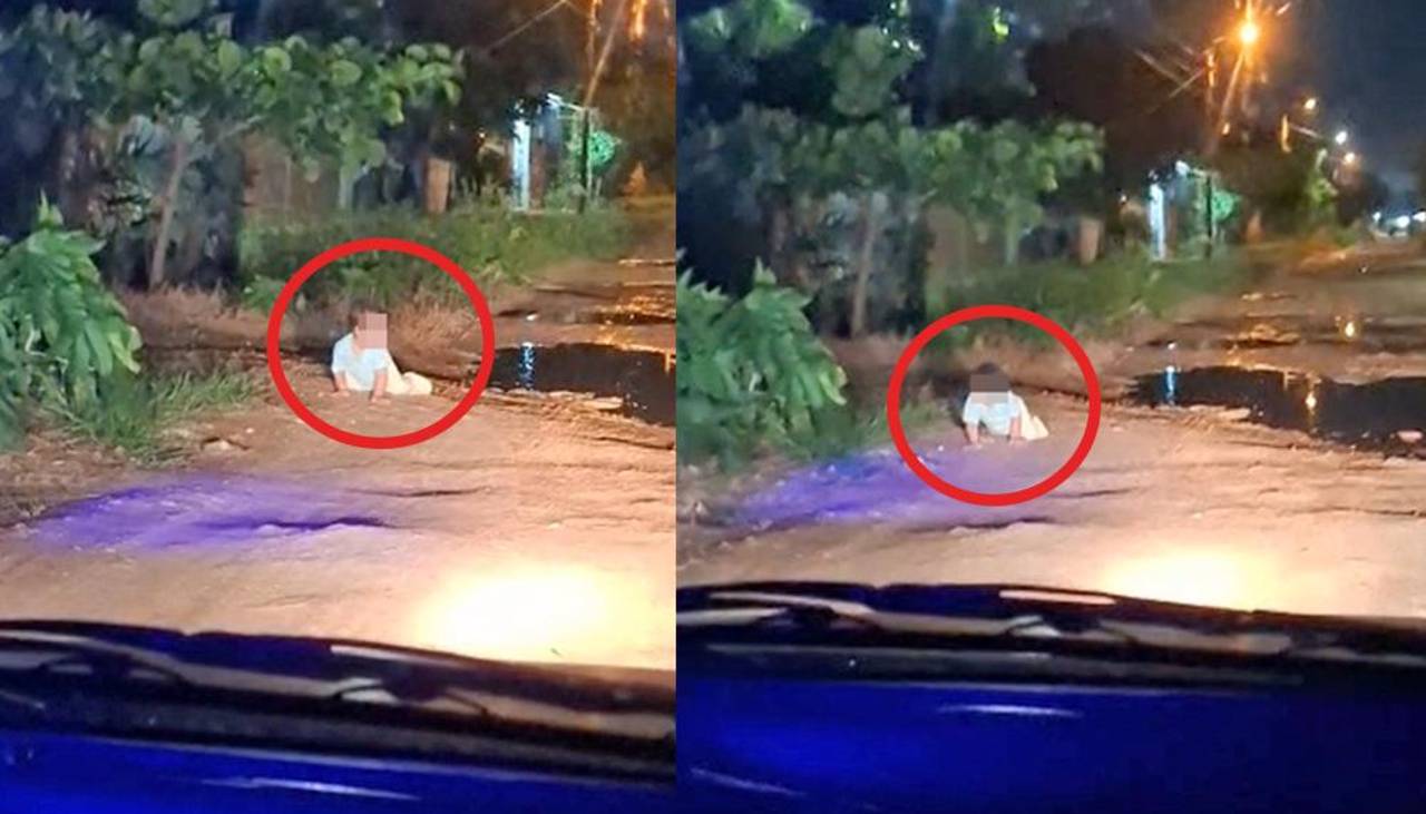 ¡Indignación! Captan a un bebé solo y gateando por una calle en plena noche