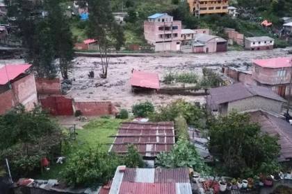 Quime, en desastre por destrozos tras la riada y la alerta por lluvias en gran parte del país sigue este domingo